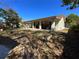 Expansive backyard with a covered patio, offering a perfect outdoor retreat at 1663 Sunburst Way, Kissimmee, FL 34744