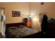 Bedroom with a comfortable bed, warm lighting, and personal decor at 1663 Sunburst Way, Kissimmee, FL 34744