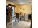 Cozy dining area with a view to the backyard, adjacent to the kitchen at 1663 Sunburst Way, Kissimmee, FL 34744