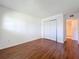 Bedroom with wood floors and a closet at 1695 Lee Rd # E205, Winter Park, FL 32789