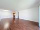 Inviting living room showcases modern flooring and a seamless transition to the adjacent kitchen at 1695 Lee Rd # E205, Winter Park, FL 32789