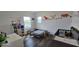 A bedroom featuring dinosaur decor, plenty of light, and wood flooring at 18410 Blue Heron Cir, Deer Island, FL 32778