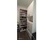 Organized closet with shelves for shoes, purses, and drawers for storage at 18410 Blue Heron Cir, Deer Island, FL 32778