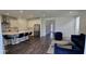 Inviting living space featuring a modern kitchen and comfortable seating at 18410 Blue Heron Cir, Deer Island, FL 32778