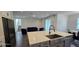 Living Room Area, showing access to the second floor of the home at 18410 Blue Heron Cir, Deer Island, FL 32778