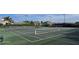 Well-maintained tennis courts ready for a match at 18410 Blue Heron Cir, Deer Island, FL 32778