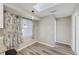 This well-lit dining area features tile flooring, and a modern light fixture at 2169 Webster Ct, Deltona, FL 32738