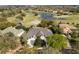 Spacious home features a lush, green yard, and easy access to the golf course at 2207 Cairns Ct, Orlando, FL 32835