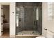 Bathroom featuring an enclosed shower, and the entrance to a bedroom at 2207 Cairns Ct, Orlando, FL 32835