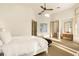 Bright bedroom with light hardwood floors, a ceiling fan, and a comfortable bed at 2207 Cairns Ct, Orlando, FL 32835