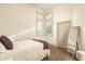 Comfortable bedroom with neutral tones, large window, and closet at 2207 Cairns Ct, Orlando, FL 32835