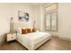 Comfortable bedroom with neutral tones, lots of natural light, and sleek side tables at 2207 Cairns Ct, Orlando, FL 32835
