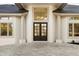 Detailed front entrance of a home with decorative windows at 2207 Cairns Ct, Orlando, FL 32835