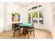 Game room with a round table, chairs, and large arched window with neighborhood views at 2207 Cairns Ct, Orlando, FL 32835
