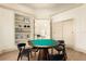 Games room featuring a round table, chairs, built-in shelving and neutral colors at 2207 Cairns Ct, Orlando, FL 32835