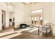 Bright living room featuring high ceilings, French doors to patio, and elegant furnishings at 2207 Cairns Ct, Orlando, FL 32835