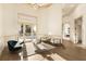 Bright living room with elegant furnishings, patio access, and backyard pool view at 2207 Cairns Ct, Orlando, FL 32835