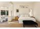 Spacious main bedroom with sitting area, large bed and lots of windows at 2207 Cairns Ct, Orlando, FL 32835