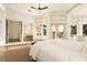Main bedroom with lots of windows and view to the outdoor balcony at 2207 Cairns Ct, Orlando, FL 32835