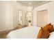 Bright main bedroom with ensuite access, large closet, and luxury finishes at 2207 Cairns Ct, Orlando, FL 32835