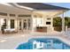 Beautiful pool, patio, and landscaping, perfect for outdoor entertaining at 2207 Cairns Ct, Orlando, FL 32835