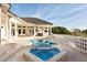 Beautiful backyard features a stunning pool, spa and plenty of space for outdoor relaxation at 2207 Cairns Ct, Orlando, FL 32835