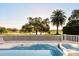 Backyard pool and spa area surrounded by lush greenery at 2207 Cairns Ct, Orlando, FL 32835