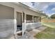 Charming entryway with stylish stone walkway leading to the screened-in porch and front door at 224 E Kelly Park Rd, Apopka, FL 32712