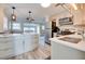 Spacious open concept kitchen and living room with stainless steel appliances and ample counter space at 224 E Kelly Park Rd, Apopka, FL 32712