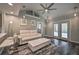 Comfortable living room with plush seating, modern lighting, and stylish rug for a cozy and inviting atmosphere at 224 E Kelly Park Rd, Apopka, FL 32712