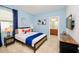 Comfortable bedroom with a stylish bed, colorful accents, and modern furnishings at 2555 Shanti Dr, Kissimmee, FL 34746