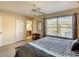 Main bedroom with ceiling fan, carpet flooring and double bed at 2706 Bushman Dr, Kissimmee, FL 34746