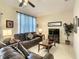 Comfortable living room featuring neutral tones, and ample seating at 2706 Bushman Dr, Kissimmee, FL 34746