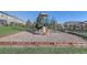 Community playground with slide and play structures, a great recreational space for families at 2725 Econ Landing Blvd, Orlando, FL 32825