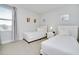 Bedroom featuring two twin beds, natural light and neutral decor at 280 Burma St, Kissimmee, FL 34747