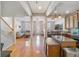 Open-concept design with hardwood floors, kitchen island, and stainless steel appliances at 2979 Upper Park Rd, Orlando, FL 32814