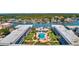Stunning aerial view of the community with access to a pool, green spaces, and waterfront amenities at 315 N Causeway # B302, New Smyrna Beach, FL 32169