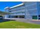 Exterior view of building with covered parking at 315 N Causeway # B302, New Smyrna Beach, FL 32169