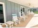 Relax on the patio with rocking chairs and enjoy the fresh air at 315 N Causeway # B302, New Smyrna Beach, FL 32169