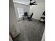 Cozy room features carpet, a computer desk and chair at 3166 Sweet Acres Pl, St Cloud, FL 34772