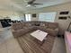 Cozy living room with a comfortable sectional sofa and modern decor at 3166 Sweet Acres Pl, St Cloud, FL 34772