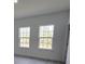 Bedroom boasts natural light from two windows and luxury vinyl plank flooring at 3519 Sw 131St Place St, Ocala, FL 34473