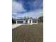 Charming single-story home boasts a modern design, complemented by a well-manicured lawn and neutral color palette at 3519 Sw 131St Place St, Ocala, FL 34473