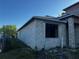 New home construction featuring block walls, window openings, and unfinished roof at 3627 Lincoln St, Sanford, FL 32771