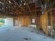 New home construction featuring wood framing, open ceiling beams and block walls at 3627 Lincoln St, Sanford, FL 32771