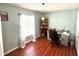 Bright room with wood floors, a desk, and window providing natural light at 417 Rio Grande Ct, Kissimmee, FL 34759