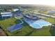 Aerial view of the community clubhouse with a pool, basketball court and playground at 417 Rio Grande Ct, Kissimmee, FL 34759