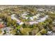 Aerial view of a residential community showcasing well-maintained homes, green spaces, and convenient parking at 5258 Tunbridge Wells Ln # 1902, Orlando, FL 32812