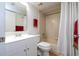 Standard bathroom featuring a shower-tub combo with neutral tile and a white vanity at 5258 Tunbridge Wells Ln # 1902, Orlando, FL 32812