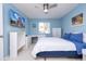 This bedroom is bright and spacious, featuring a built-in desk and ample closet space at 5258 Tunbridge Wells Ln # 1902, Orlando, FL 32812